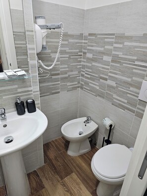 Room, Multiple Beds, Non Smoking, Private Bathroom | Bathroom | Hair dryer, towels, soap, shampoo