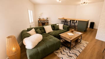 Superior Apartment | Living area | Flat-screen TV, video game console
