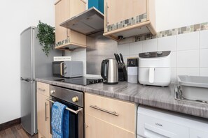 Apartemen | Dapur pribadi | Lemari es, microwave, oven, dan kompor