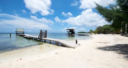 Modern Beachfront Home - Steps from the Sea w/ Patio, Shared Pool & Dock