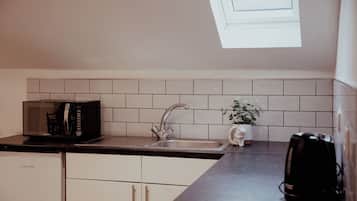 Fridge, microwave, electric kettle, toaster