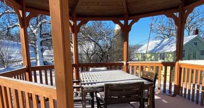 Ranch style farmhouse lodging with upper and lower bedrooms, one and half bath