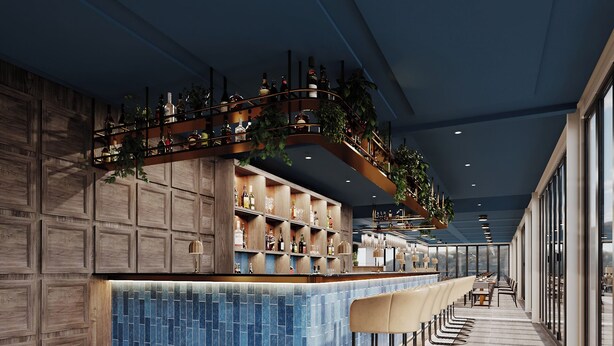 Eine moderne Bar mit einer langen Theke, Barhocker und einer Auswahl an Flaschen und Gläsern.