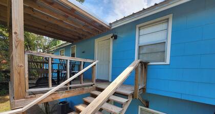 4 bedroom house walking distance to the lake, with 3 kayaks and a game garage.