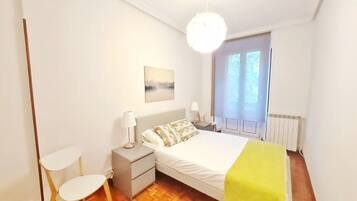 2 dormitorios, tabla de planchar con plancha, wifi y ropa de cama