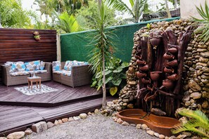 Terrace/patio - SUÍTE ARMAÇÃO - Suli Pousada na Lagoa da Conceição Florianópolis SC (Lagoa da Conceição Florianópolis)