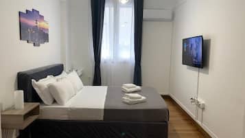 1 habitación, tabla de planchar con plancha, wifi gratis y ropa de cama