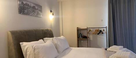 1 chambre, fer et planche à repasser, Wi-Fi gratuit, draps fournis