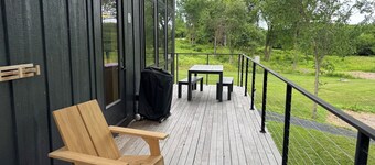 Tradstuga: modern lakefront tree cottage w/ sauna