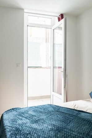 1 bedroom, desk, iron/ironing board, travel cot