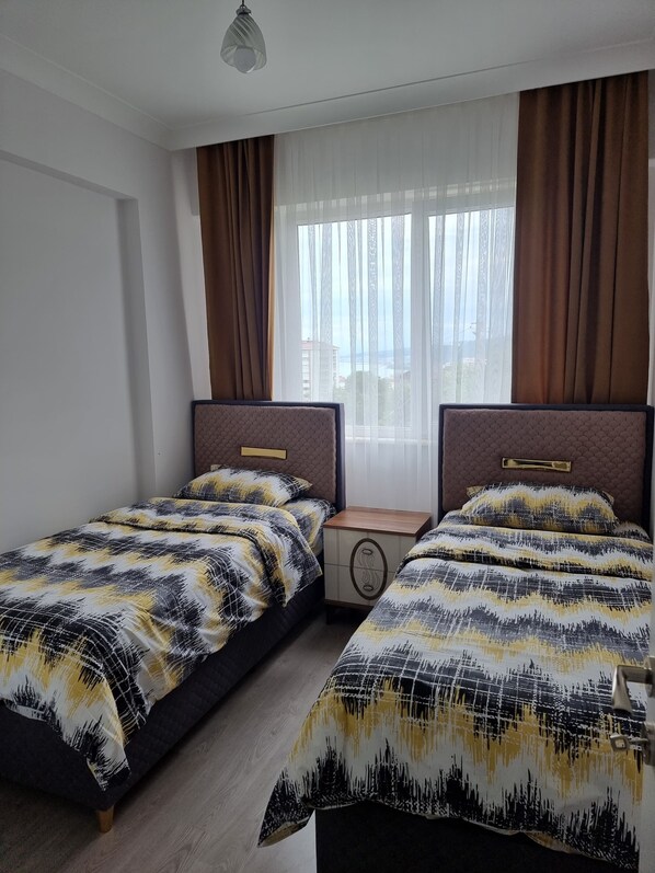 2 slaapkamers, een strijkplank/strijkijzer, wifi, beddengoed