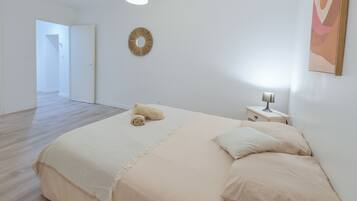 1 bedroom, desk, iron/ironing board, travel crib