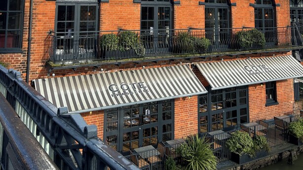A brick building with arched windows and a sign reading "Côte Brasserie". - Windsor Castle panoramic views. Stay in the heart of Royal history (Eton)