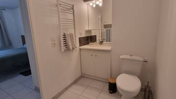 Shower, towels, soap, toilet paper