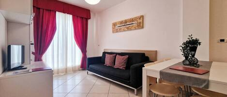 Apartamento, 1 quarto, terraço | Sala de estar