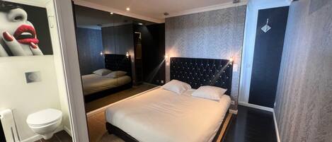 1 غرفة نوم ومكواة/لوح كي وواي فاي وملاءات أسرّة