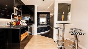 Fridge, microwave, dishwasher, coffee/tea maker