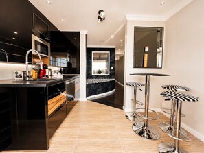 Fridge, microwave, dishwasher, coffee/tea maker