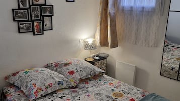1 habitación, tabla de planchar con plancha, wifi y ropa de cama