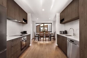 Fridge, coffee/tea maker, cookware/dishes/utensils