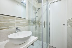 Deluxe Double Room, Non Smoking, City View | Bathroom | Shower, hair dryer, slippers, towels