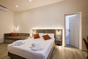 Quarto triplo luxo, para não fumantes, vista para a cidade | Vista do quarto