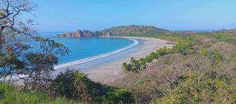 Spacious 5-bedroom beach house in delightful Playa Carrillo with WiFi, AC