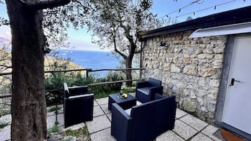 Casa, 2 quartos | Terraço/pátio