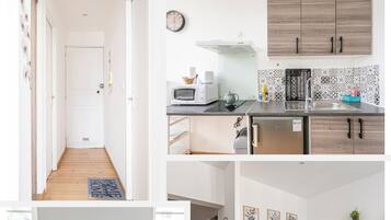 Een bureau, een strijkplank/strijkijzer, gratis wifi, beddengoed