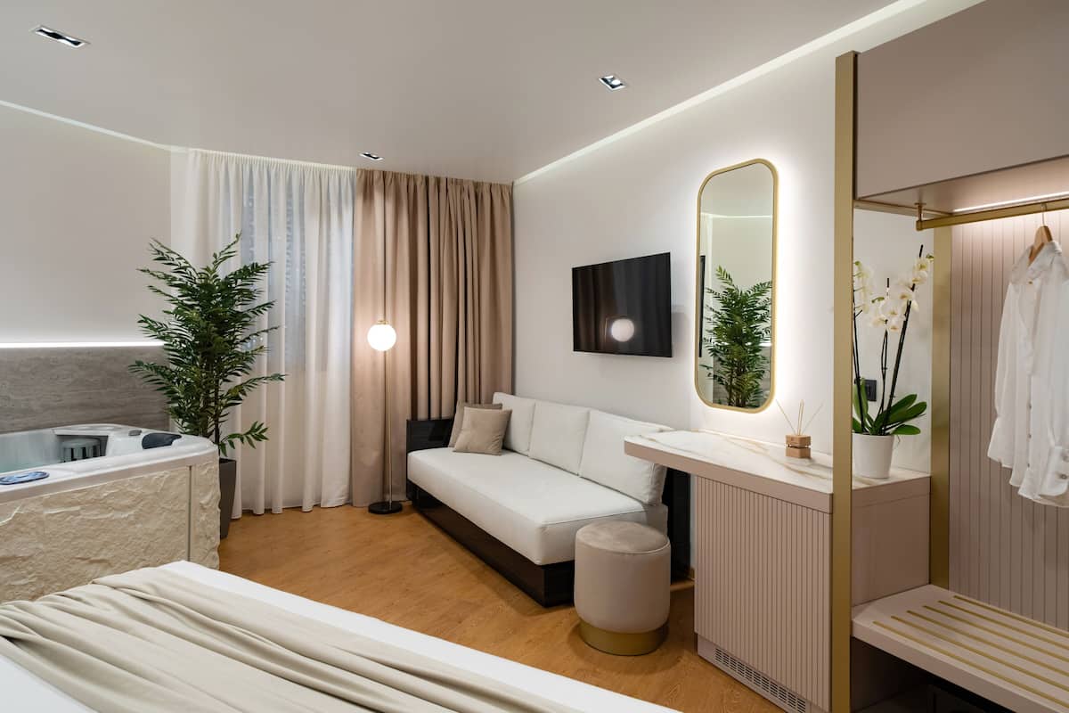 Suite, vista a la ciudad | 1 habitación, ropa de cama de alta calidad y edredón