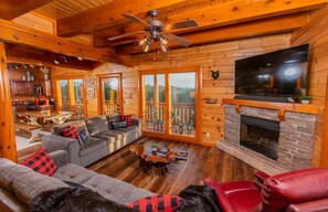 TV connectée, cheminée, jeux vidéo, lecteur de DVD