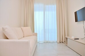 Apartemen, 1 kamar tidur, teras, pemandangan samudra | Area keluarga