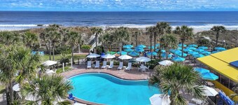 Explore Local Gems from a Relaxing Beachfront Room with Outdoor Swimming Pool