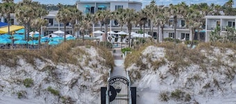 Explore Local Gems from a Relaxing Beachfront Room with Outdoor Swimming Pool