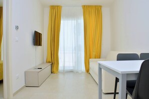 Apartment, 1 Bedroom, Terrace | Living room - Sunny and Bright Beautiful Apartment (San Michele al Tagliamento)