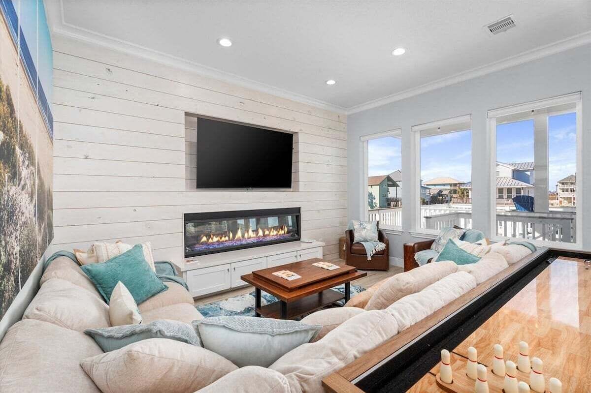 Smart TV, fireplace, books