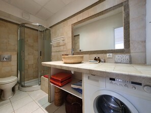 Shower, hair dryer, towels, soap