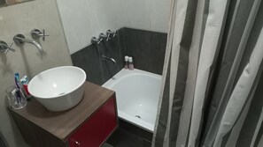 Hair dryer, bidet, towels, soap
