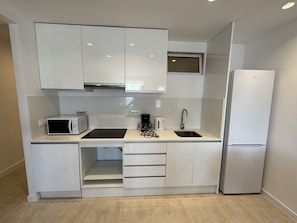 Fridge, microwave, coffee/tea maker, electric kettle
