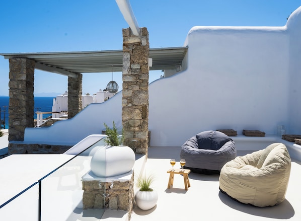 Deluxe Villa, Balcony, Pool View | Terrace/patio