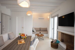 Deluxe Villa, Balcony, Pool View | Living area | 42-inch Smart TV with digital channels - CAVO BLUE VILLAS (Mykonos)