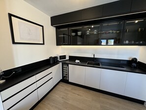 Fridge, microwave, coffee/tea maker, electric kettle