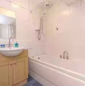 Hair dryer, towels, shampoo, toilet paper