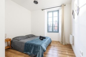 1 bedroom, desk, iron/ironing board, travel cot