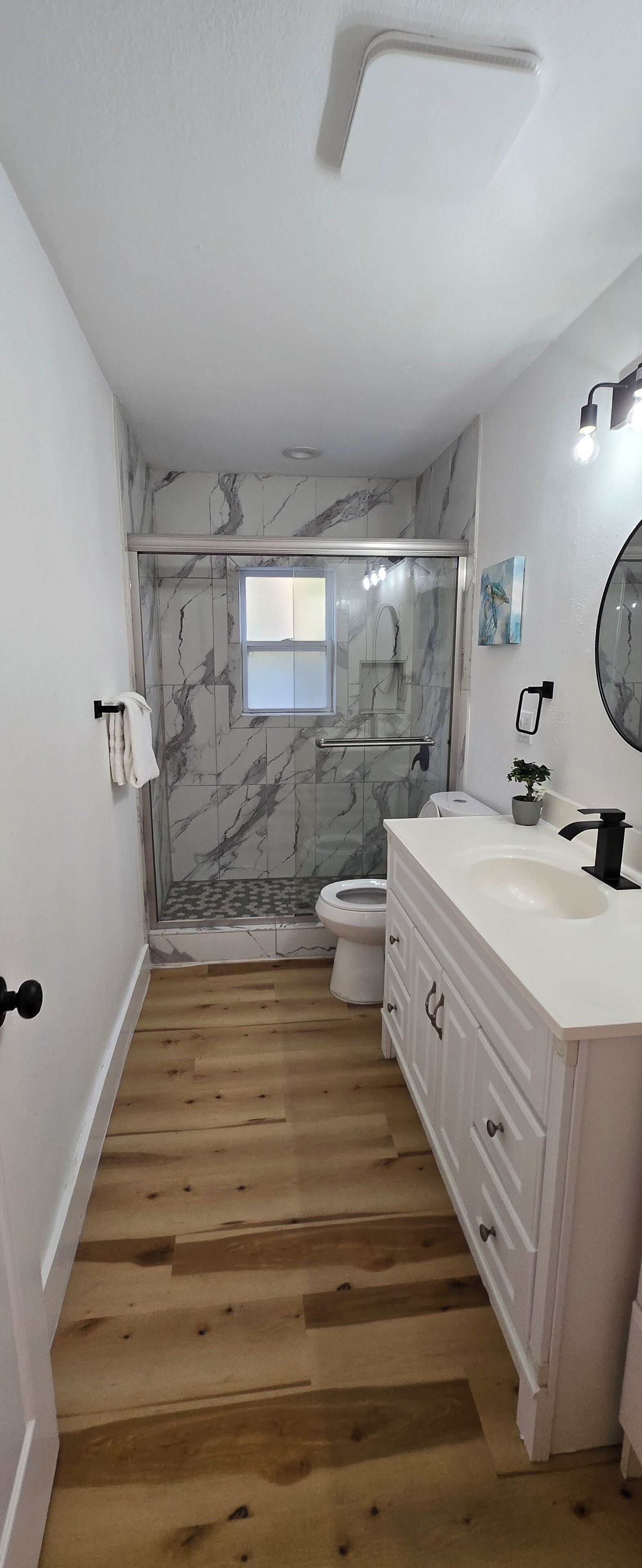 Shower, hair dryer, towels, soap