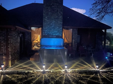 Terrace/patio. Country home with a brand new hot tub, WiFi and central air, spacious bad yard