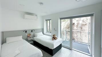 Deluxe 1 Bedroom Apartment Twin | 2 dormitorios, tabla de planchar con plancha, wifi gratis y ropa de cama