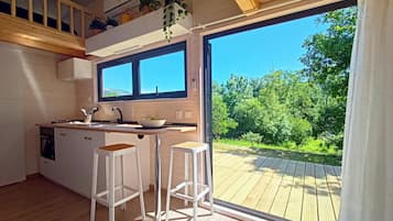 Cabin | Private kitchen | Fridge, microwave, oven, stovetop