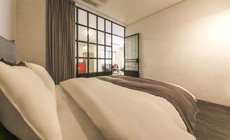 Suite with Terrace | In-room safe, desk, laptop workspace, blackout drapes