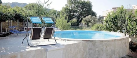 Piscine extérieure (ouverte en saison)